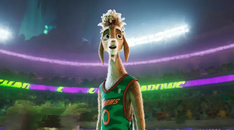 La Cabra De La Película Como Cabras Con Equipación De Baloncesto Verde En Un Estadio Iluminado.