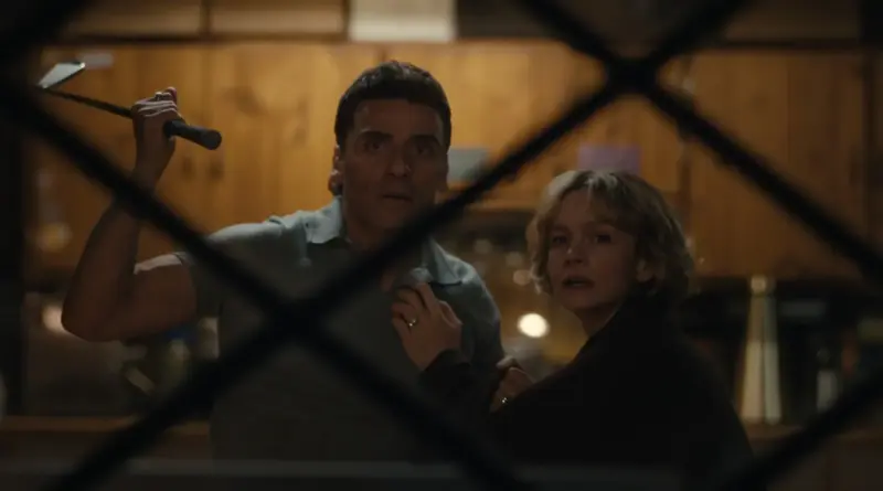 Escena De Bronca Temporada 2 Donde Oscar Isaac Sostiene Un Palo De Golf Con Actitud Defensiva Junto A Carey Mulligan.