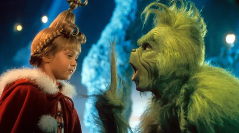 Cindy Lou Who hablando con El Grinch en la película El Grinch.